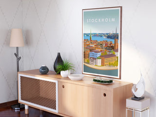 En vacker tavla över Stockholmsstad ovanför en bänk.