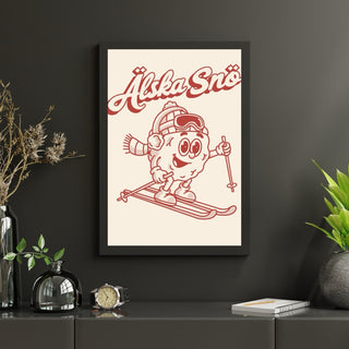 Retro poster med snöboll som åker skidor