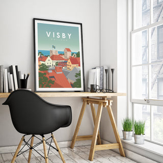 Poster med Visby och Gotlandsmotiv uppsatt på vägg