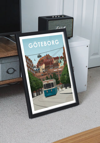 En tavla står lutad med motiv från Göteborg. Postermotiv